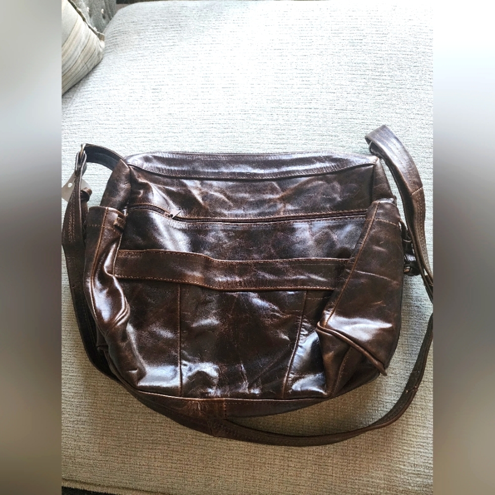 Brand New never before used genuine leather chocolate brown shoulder bag
